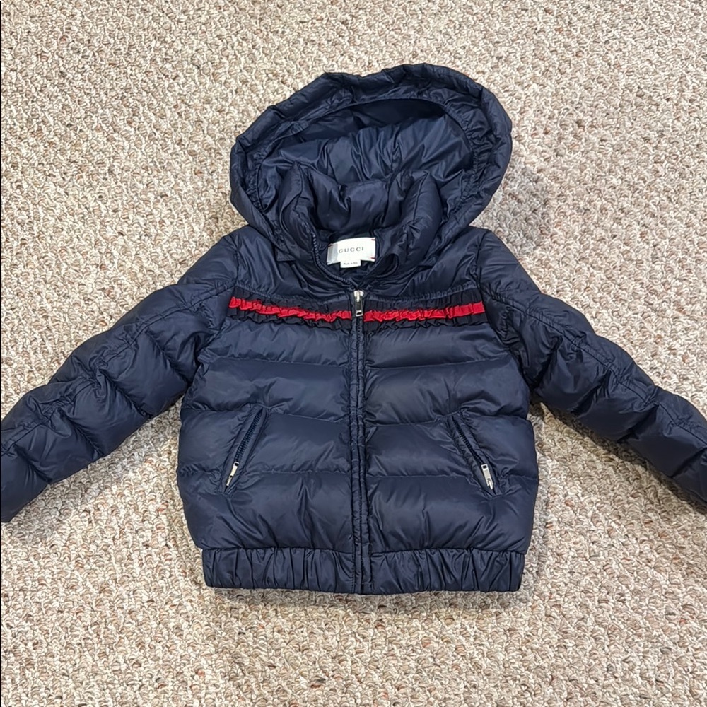 Gucci Kids Navy Puffer Jacket with Red Ruffle Accents - size 5